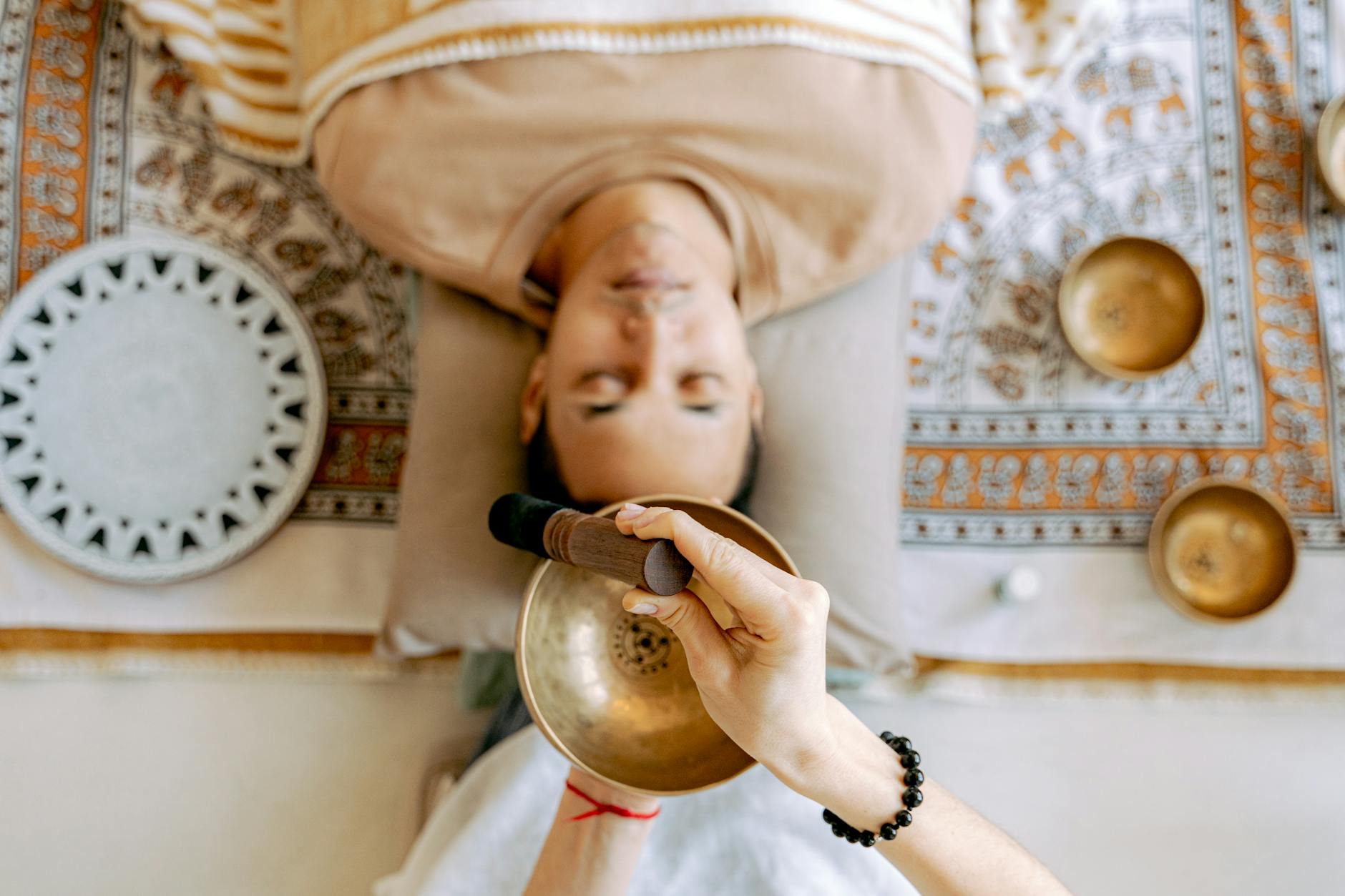 man relaxing while listening to sounds