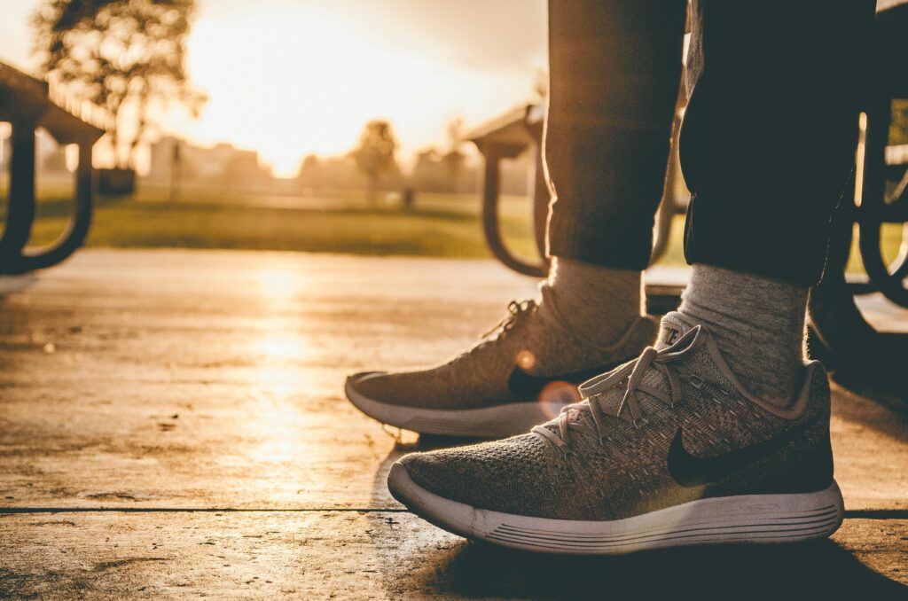 close up of someone with workout shoes on outdoors