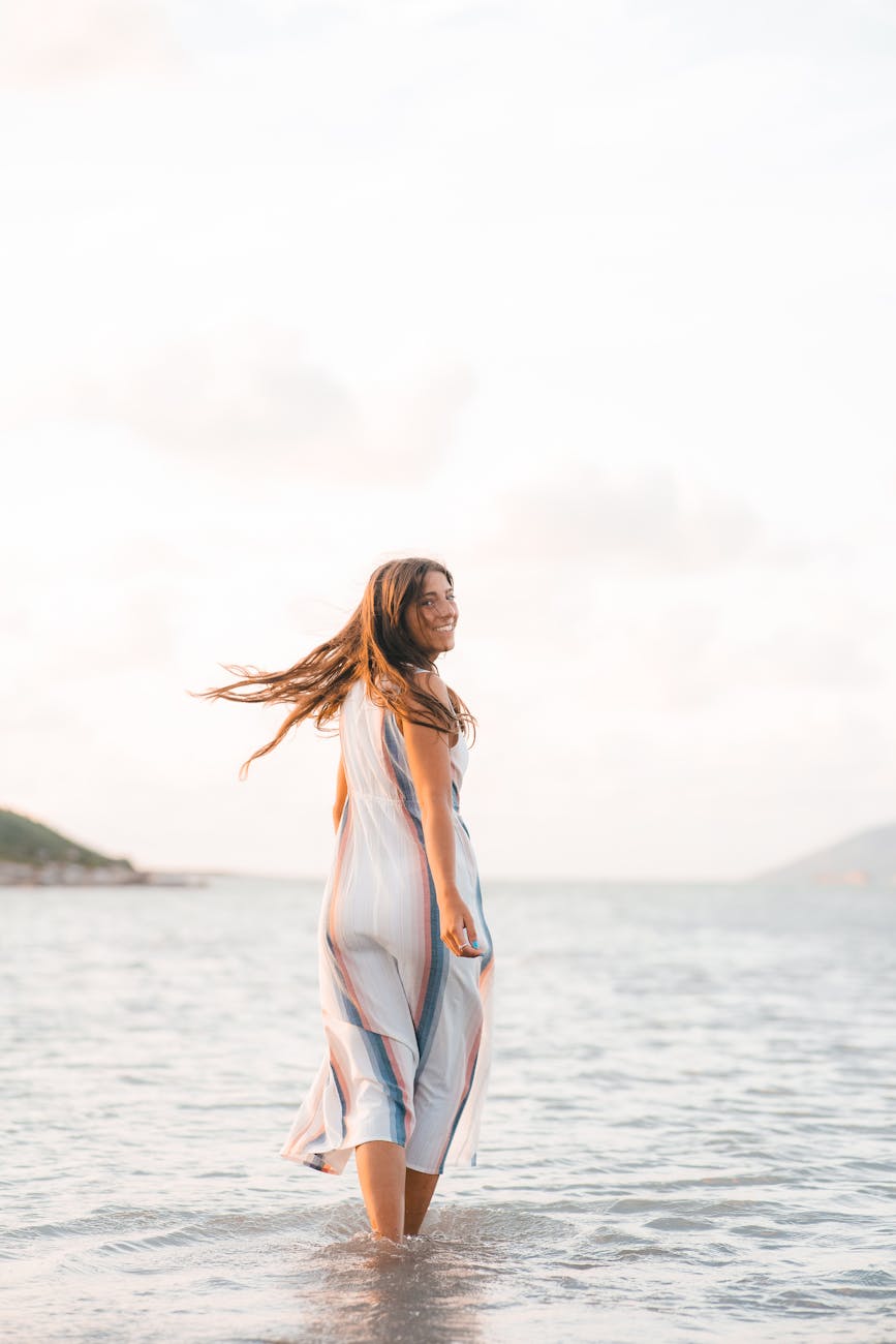 carefree woman enjoying a beach day
