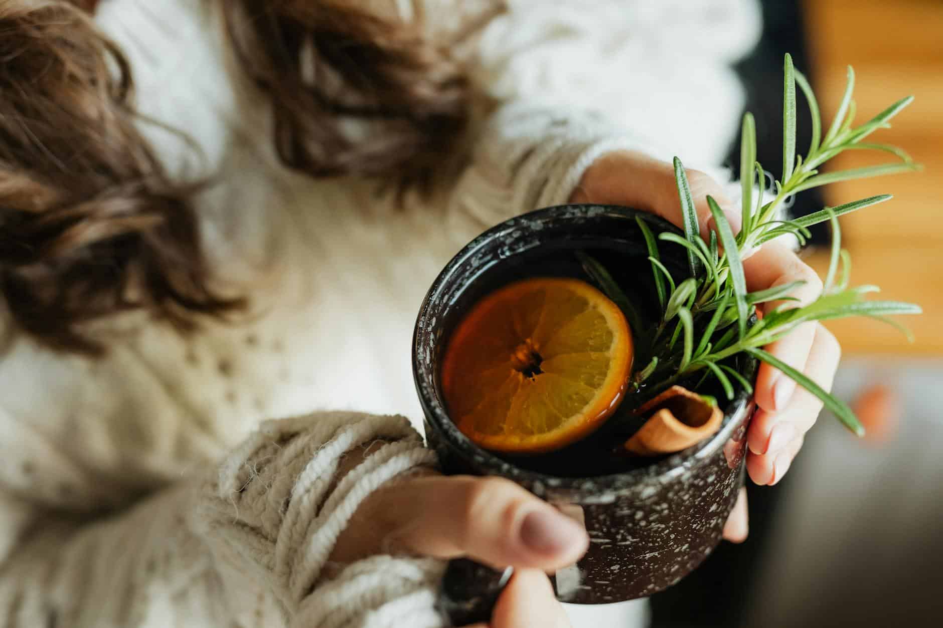 tea with herbs and lemon slice