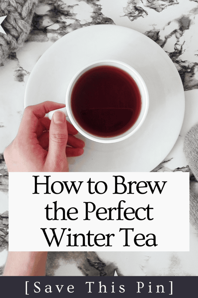 A calming herbal tea in a white cup on a marble surface, perfect for winter relaxation.