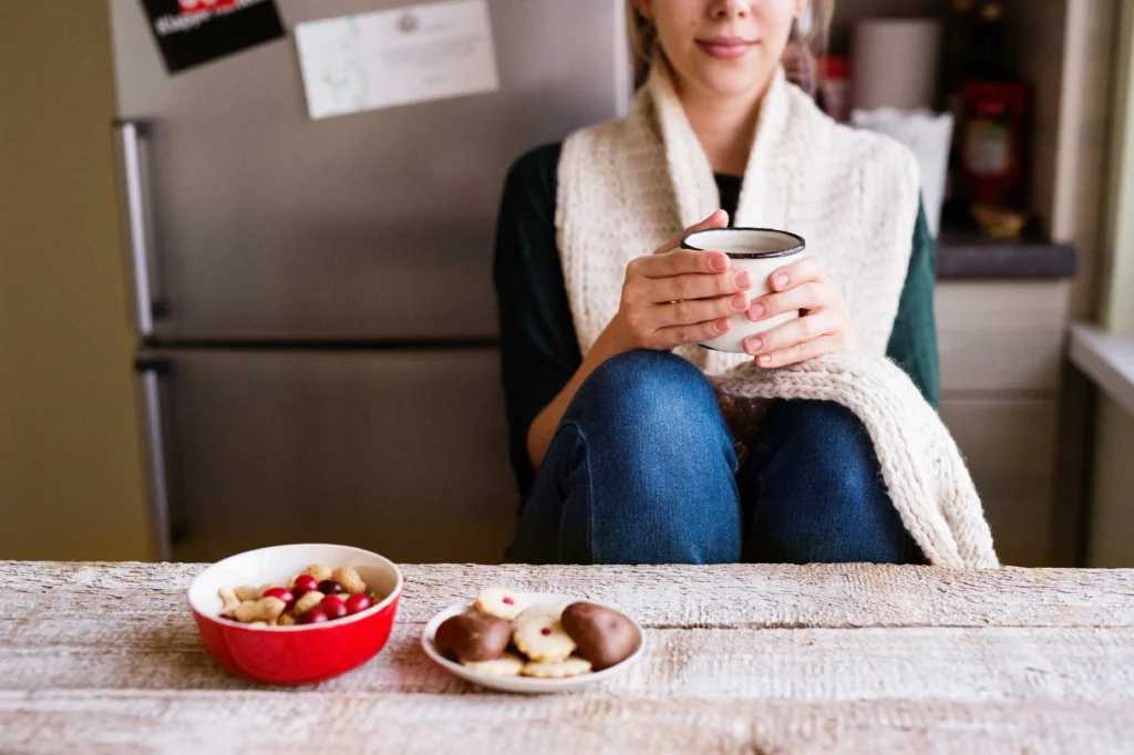 woman taking a gentle reset to ground in her kitchen