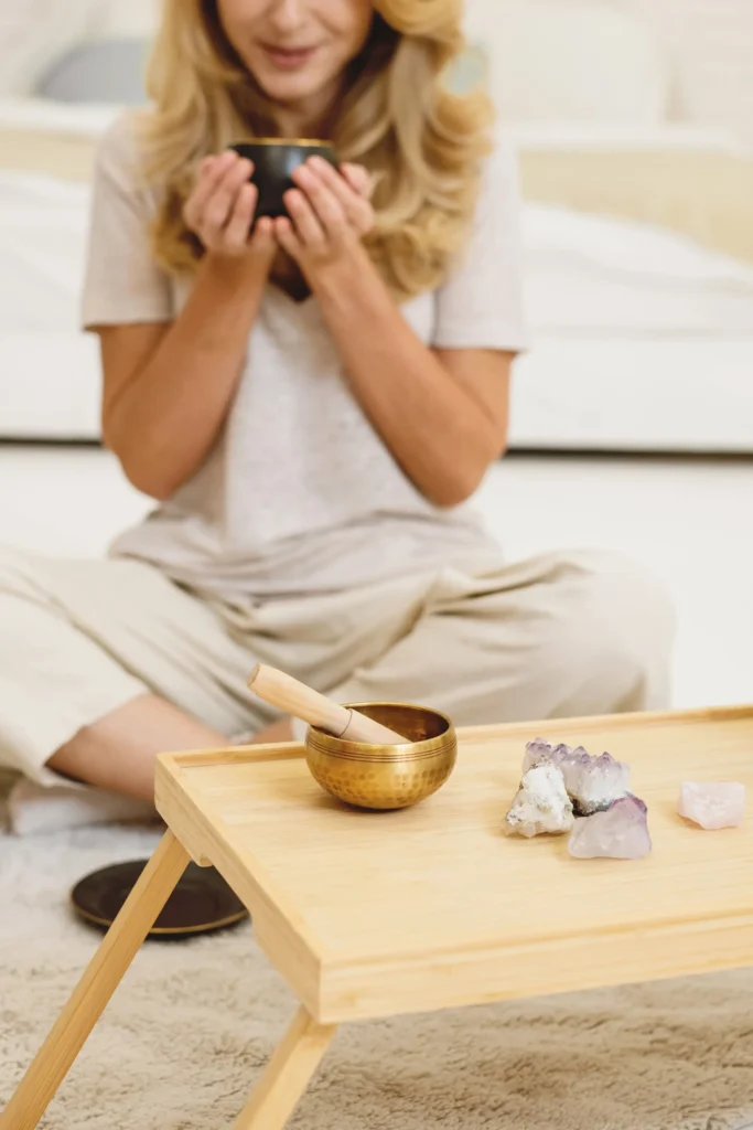 woman sitting cross legged recovered from burnout
